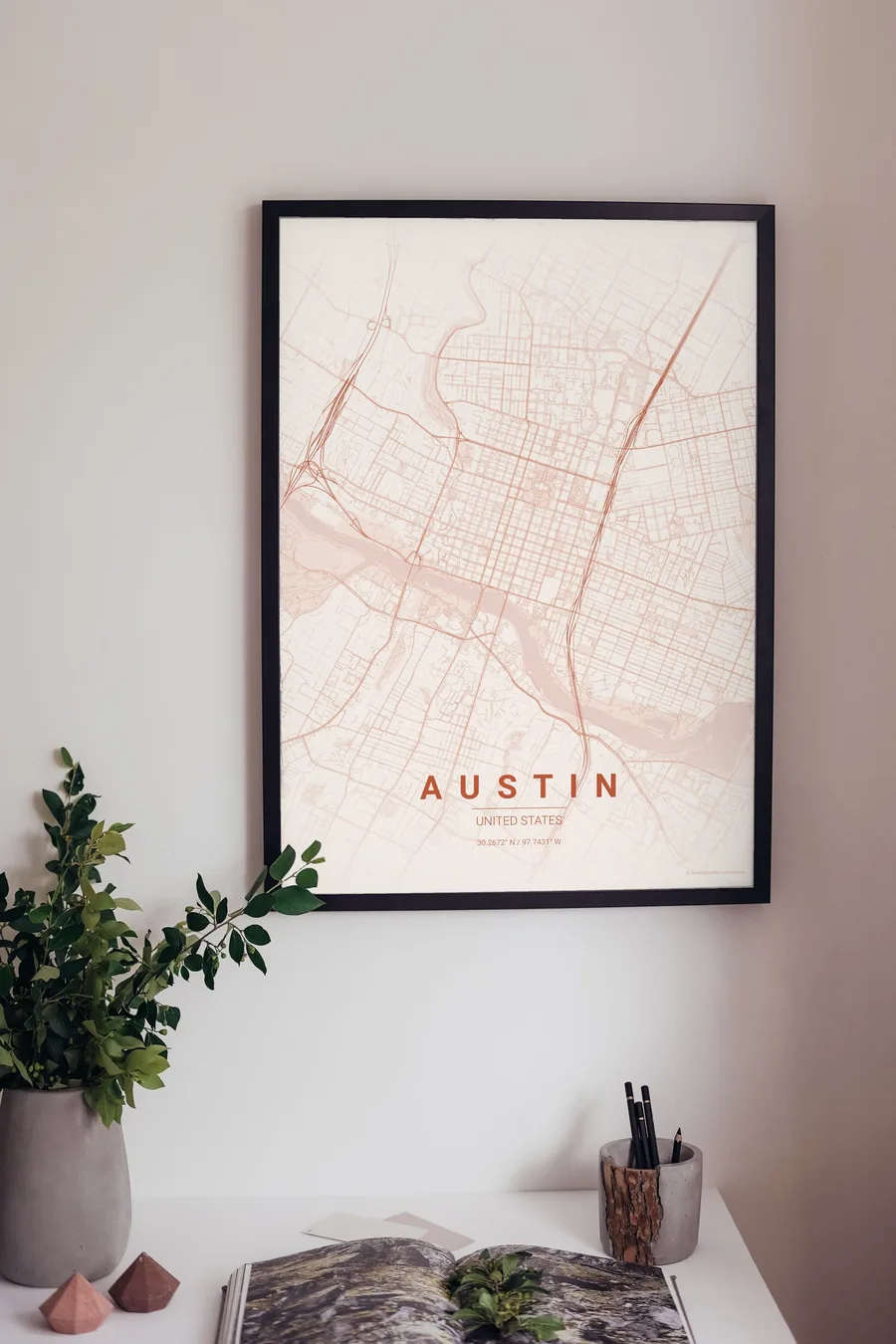 Austin map poster framed on a living-room wall