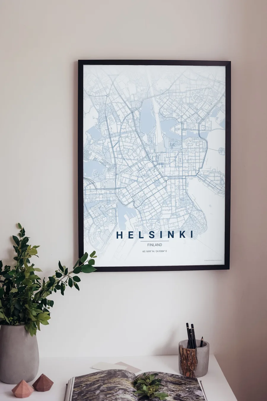 Helsinki map poster framed on a living-room wall