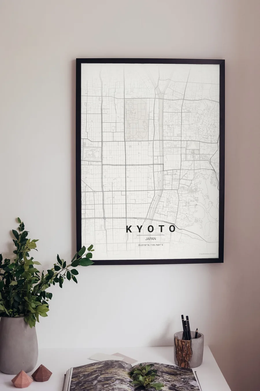 Kyoto map poster framed on a living-room wall