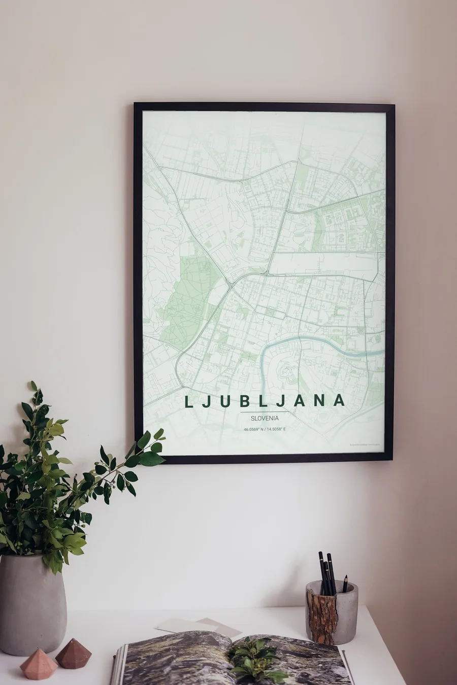 Ljubljana map poster framed on a living-room wall