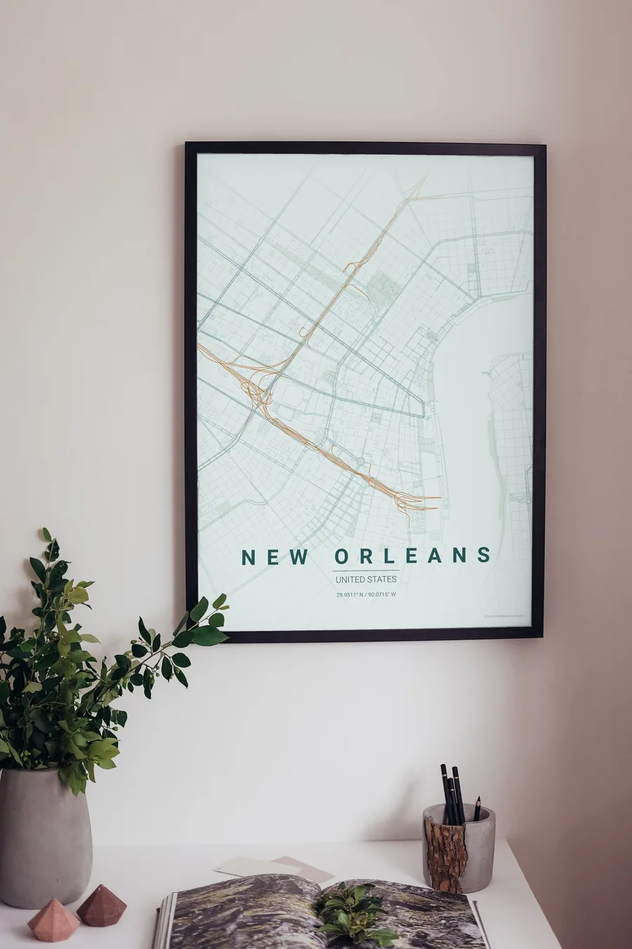 New Orleans map poster framed on a living-room wall