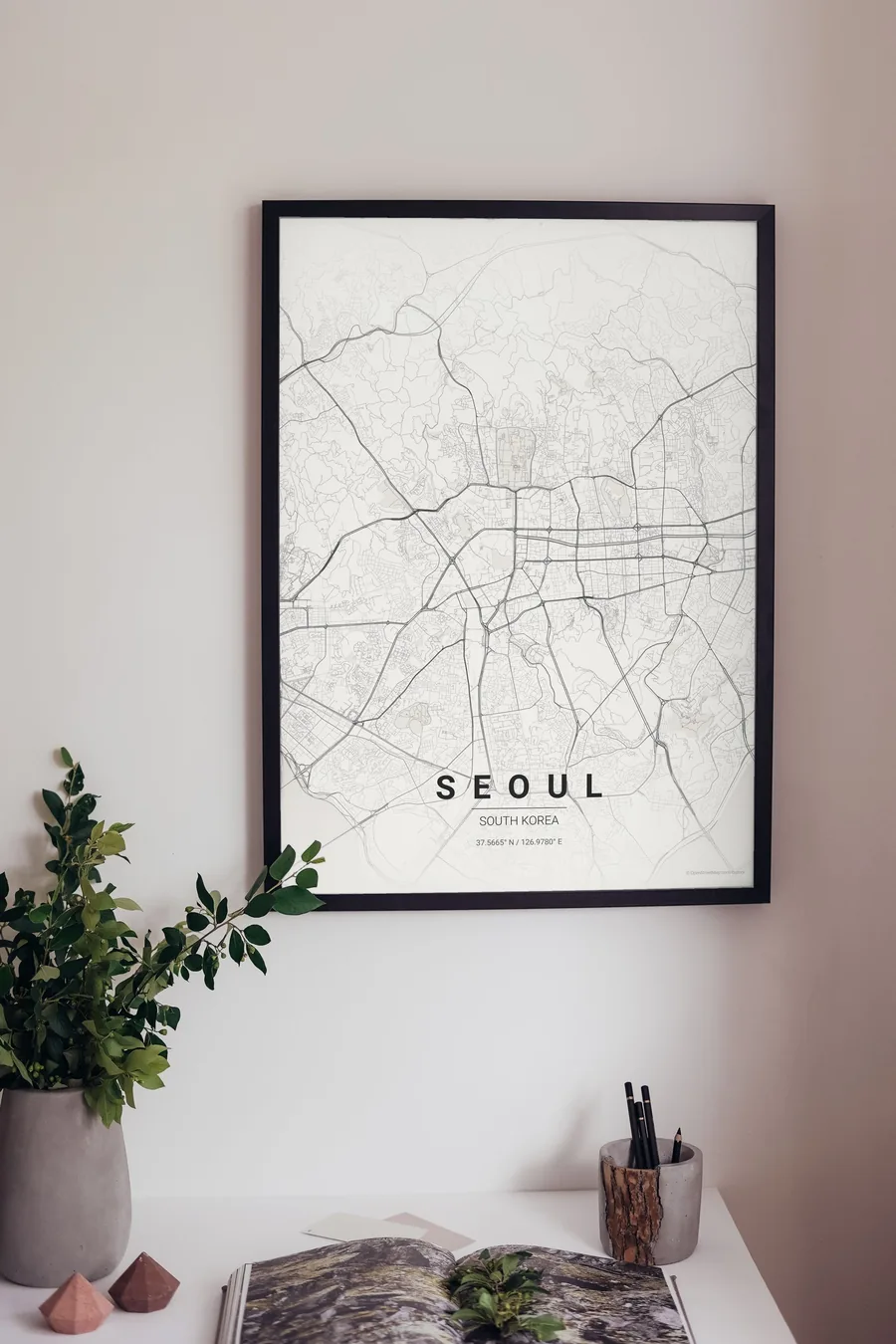 Seoul map poster framed on a living-room wall