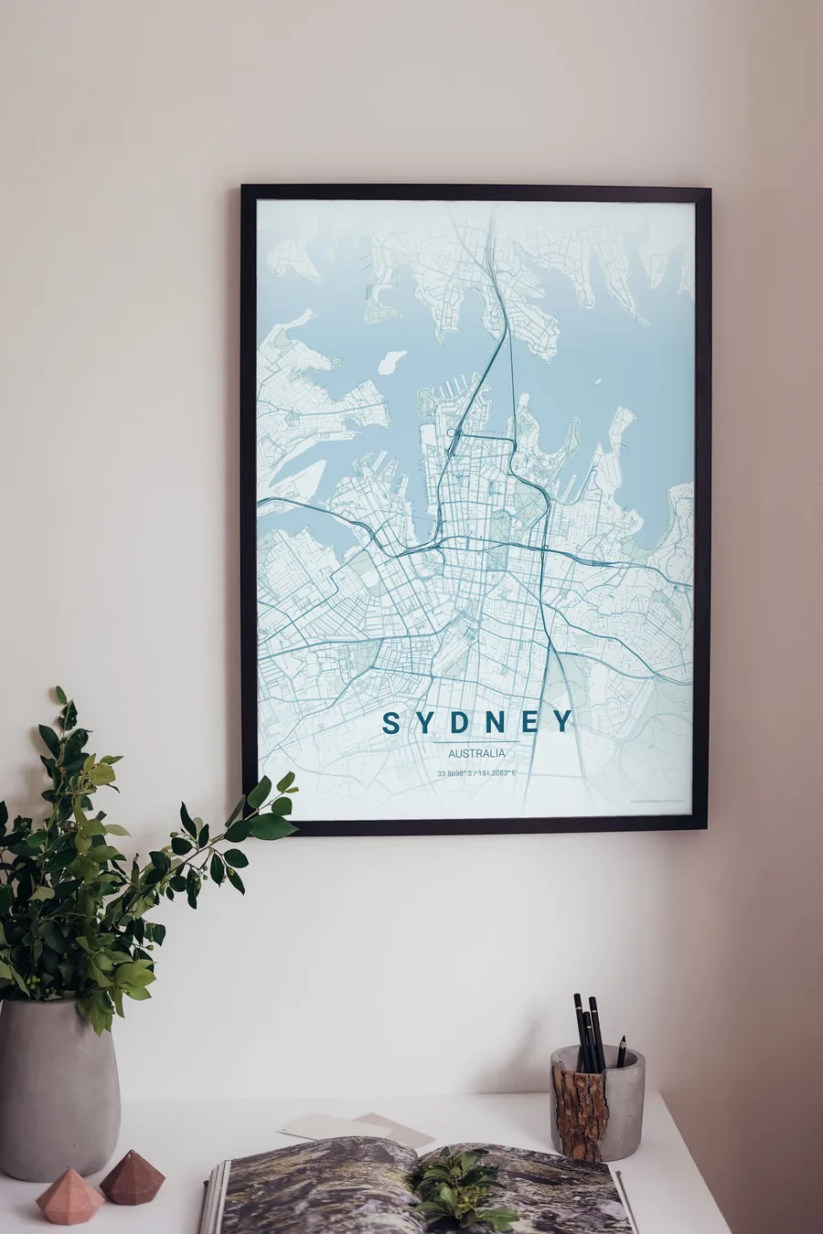 Sydney map poster framed on a living-room wall